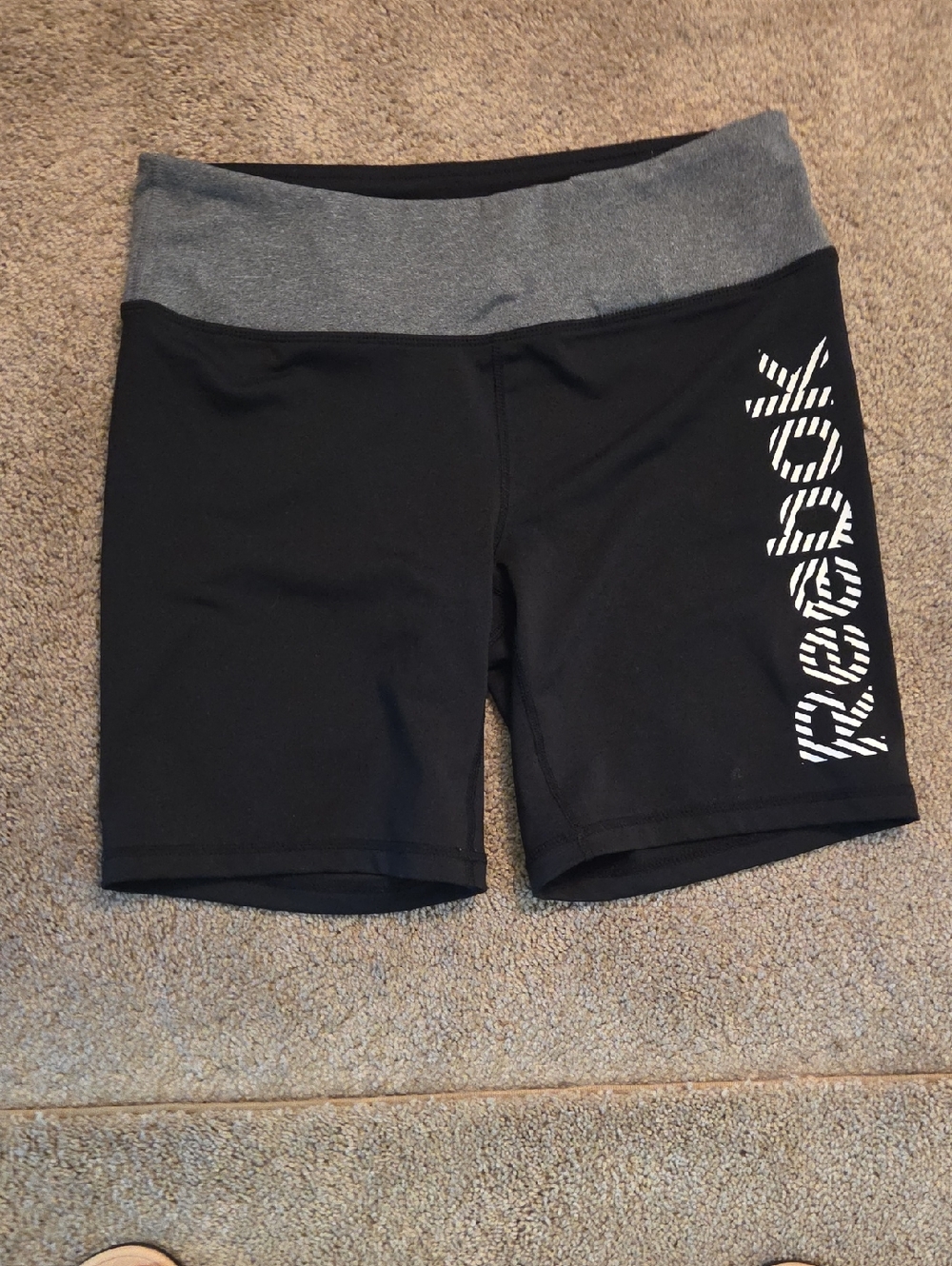 Reebok Black Bike Shorts with Gray Waistband and White Logo